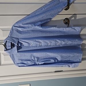 Tommy Hilfiger no Iron top size 16 color blue with white daisy.  Like new